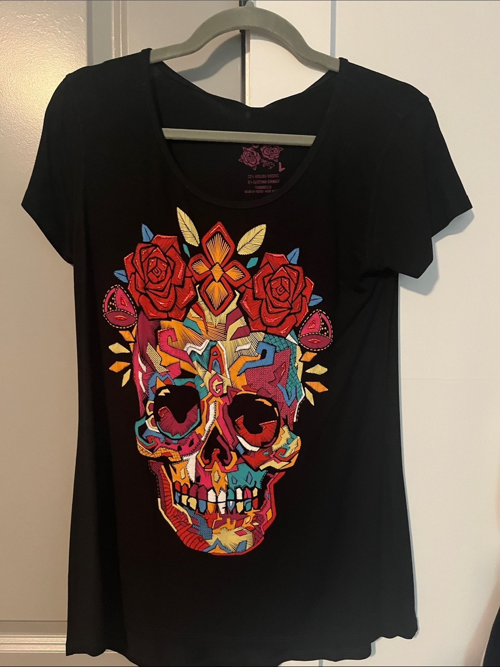 Women's Black Short-Sleeve Graphic Skull Tee with Colorful Floral Motif